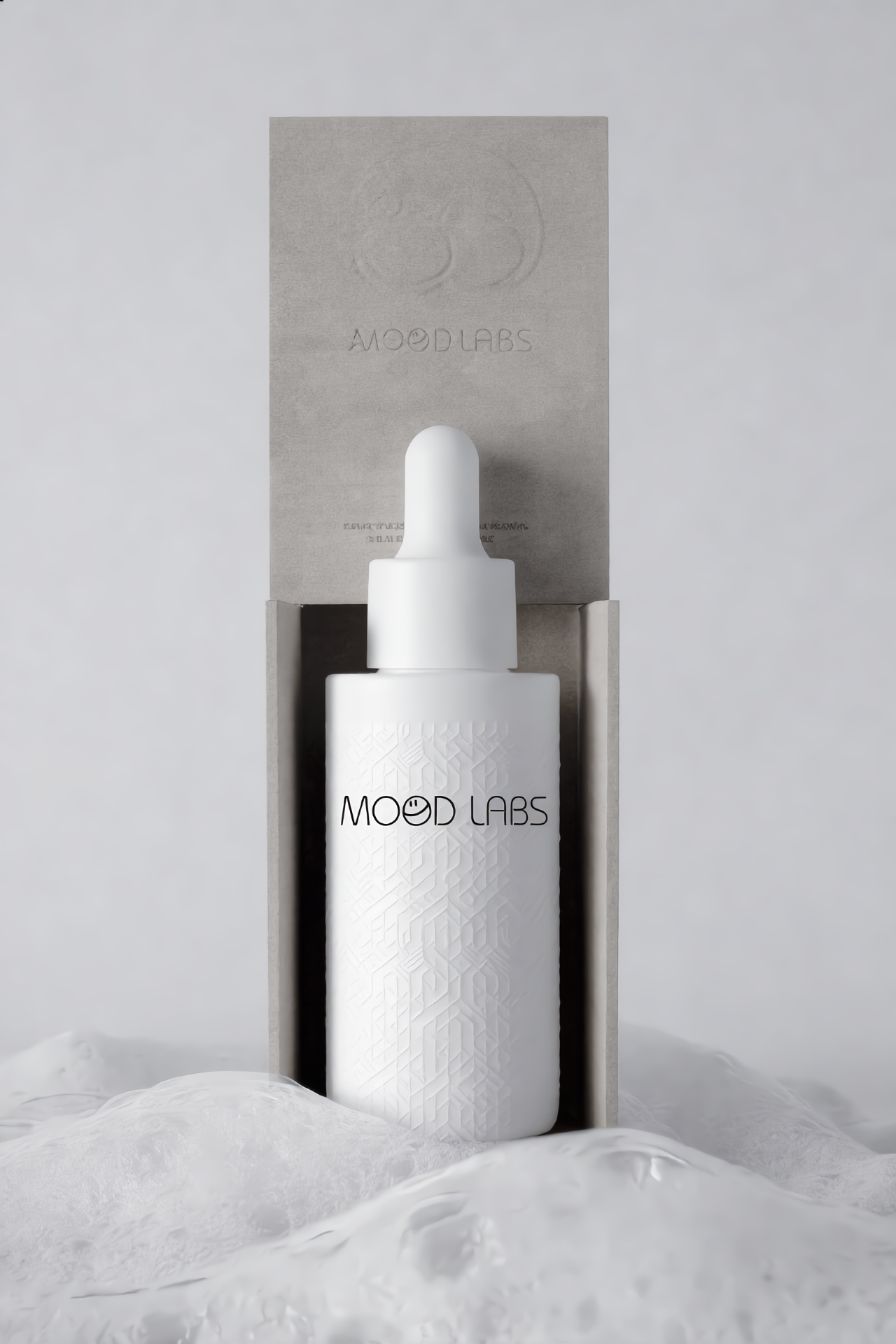 Mood Labs serum dropper with embossed paperboard carton