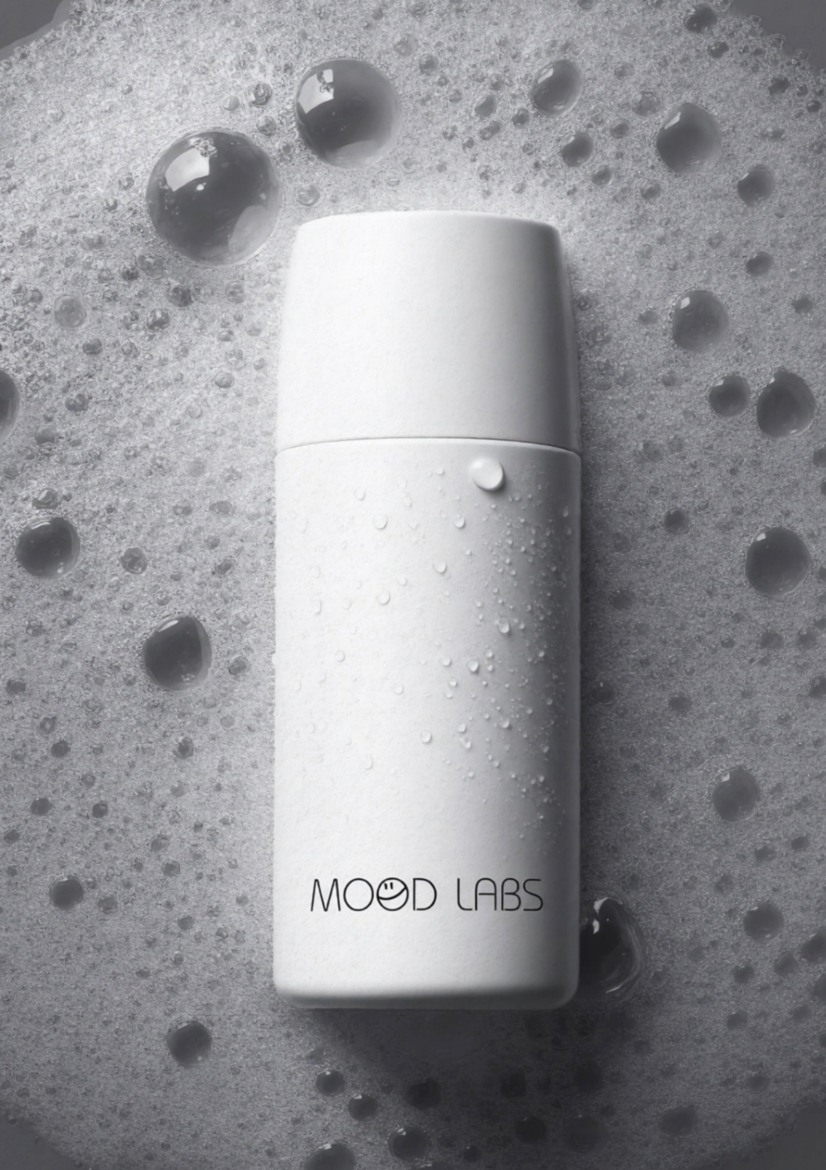 Mood Labs matte bottle in foam and water droplets