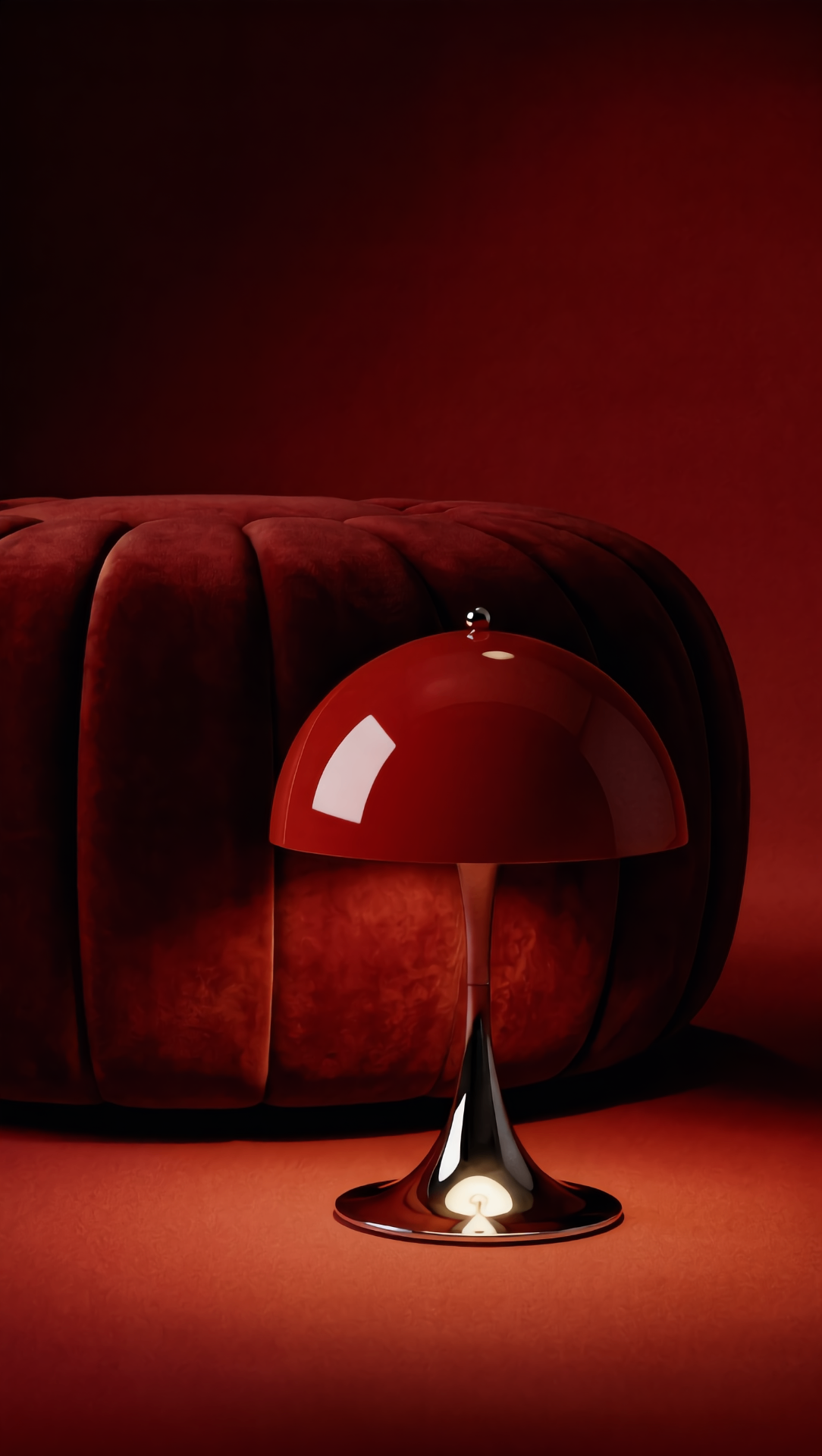 LOONA still life — crimson mushroom lamp against a velvet pouf